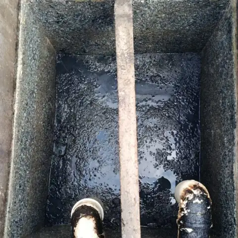 A mesma caixa de concreto depois da sucção e lavagem
